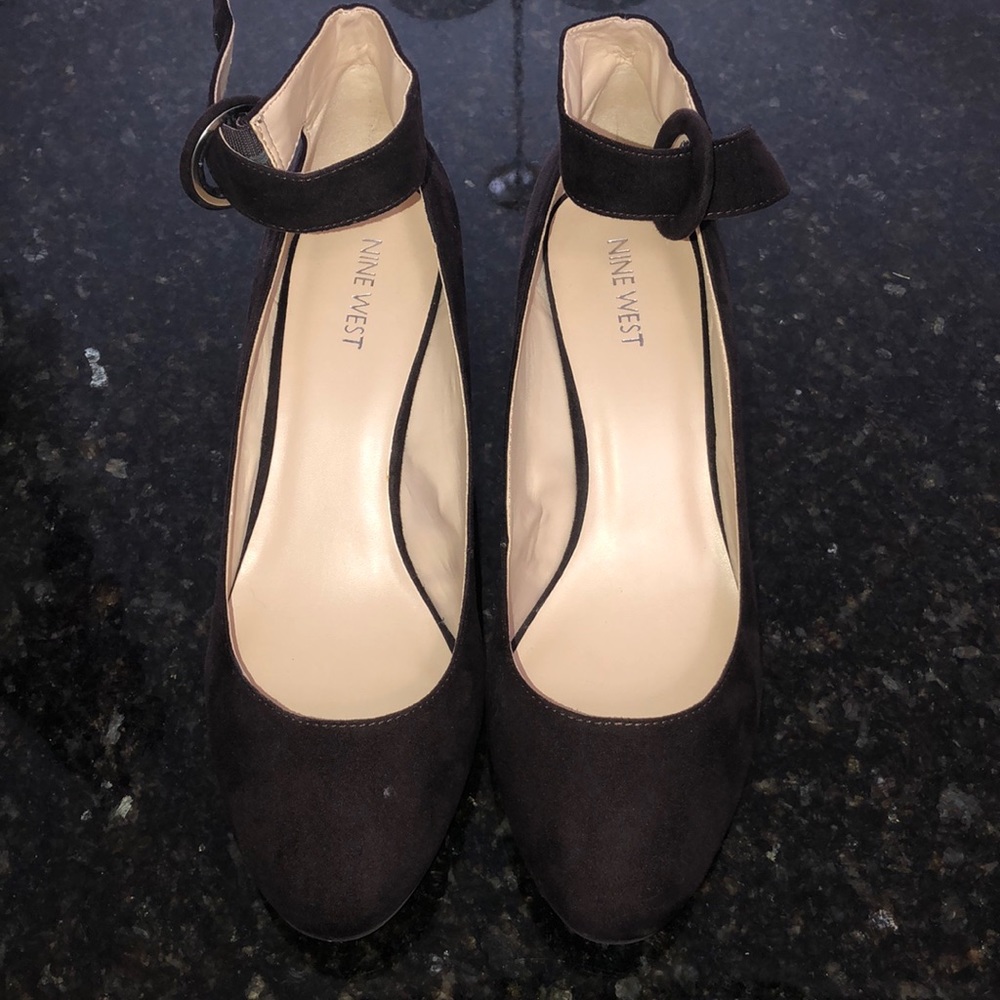 Brown Nine West pump heels.